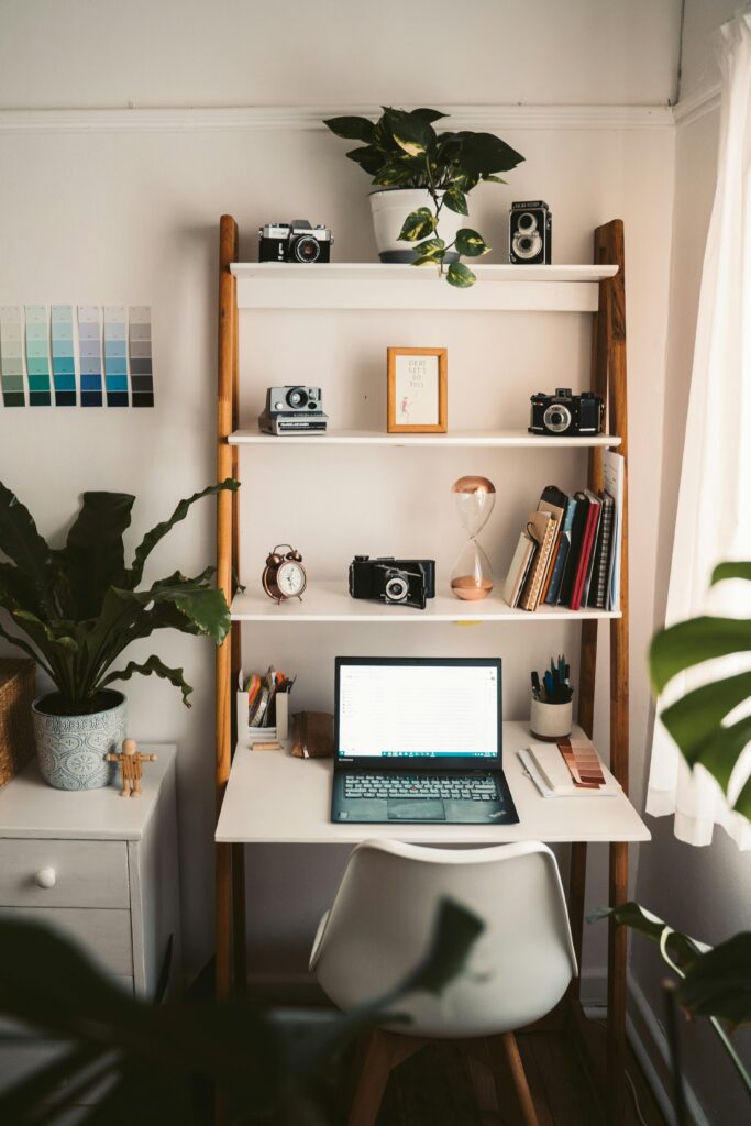 home office design with a white scandinavian chair and  air ladder desk